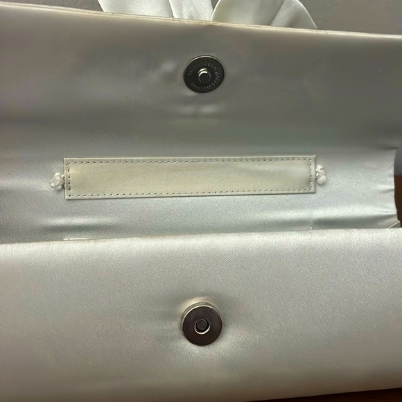 Silver clutch purse with bow detail on front - Picture 6 of 6